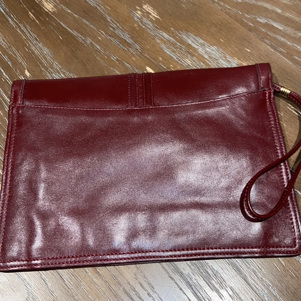 Philippe Oversized wristlet. Chocolate color with red under tone. - Picture 2 of 13